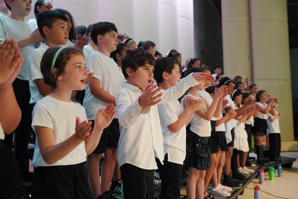 Usdan Summer Camp for the Arts Music students perform on stage at the McKinley Amphitheater
