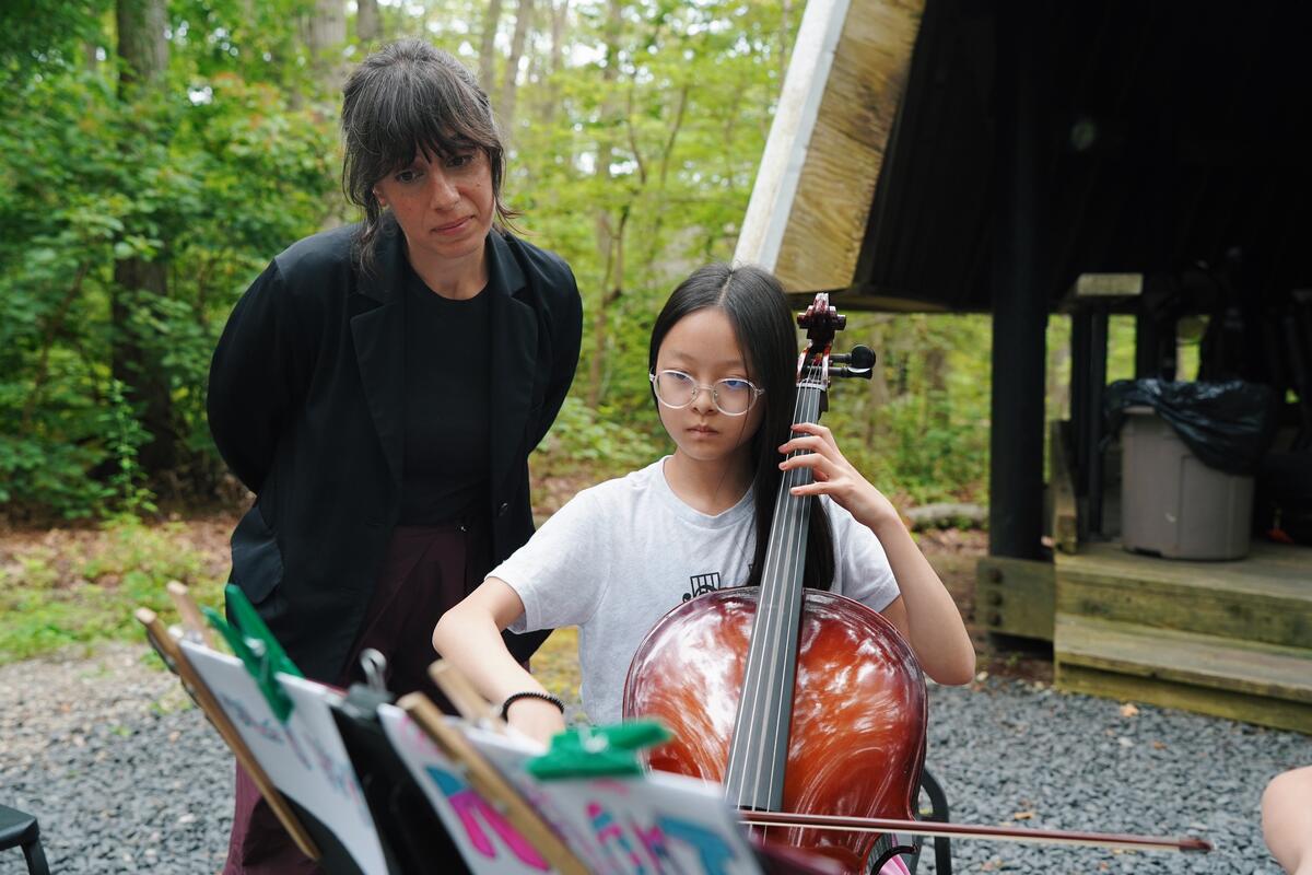 Usdan Summer Camp for the Arts Music students work with Karen Ouzounian of the Knights.