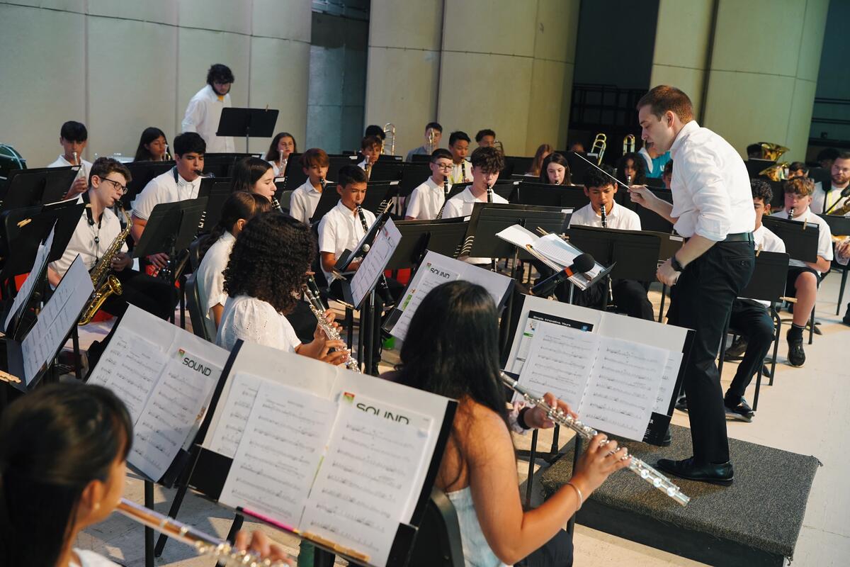 Usdan Summer Camp for the Arts Senior Band performs on stage at Festival