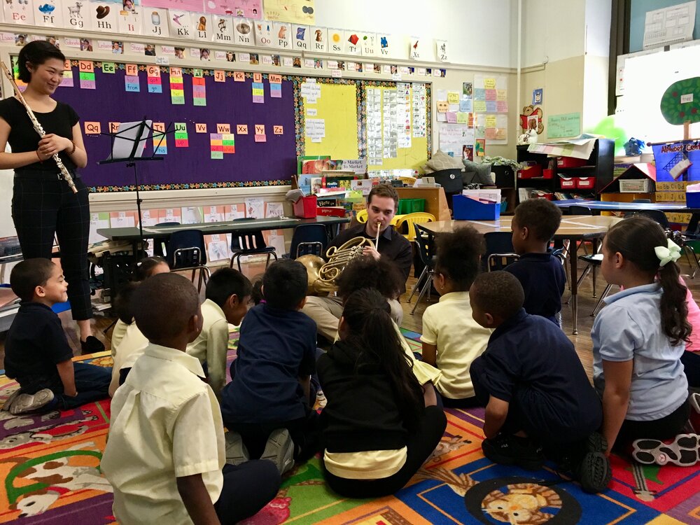 Usdan Summer Camp for the Arts Music Department Co-Chair Eric Huckins teaches young musicians in the classroom.