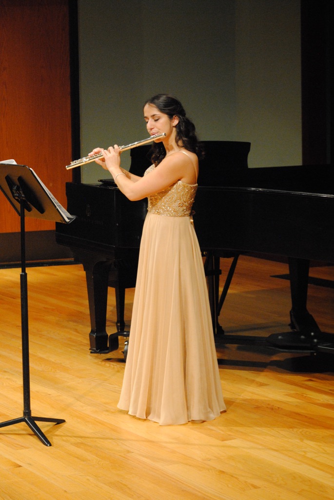 Nicole Davidson playing the flute