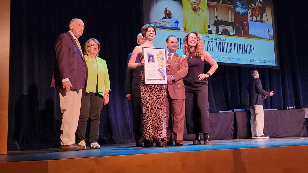 Usdan student Sara Nearenberg accepts Scholar-Artist Award during the Long Island Arts Alliance ceremony April 28.