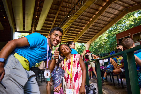 Discovery student at Festival with teacher
