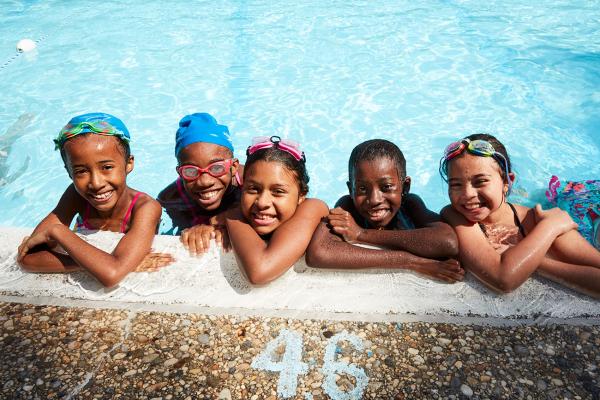 Kids in Usdan swimming pool at kids summer camp on Long Island