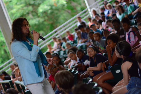 Maroulis performing for students