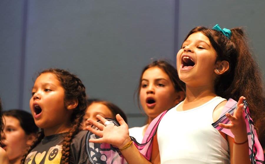 Usdan Summer Camp for the Arts students perform on stage in the McKinley Amphitheater