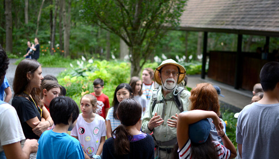 Usdan Students gather around Wildman Steve Brill