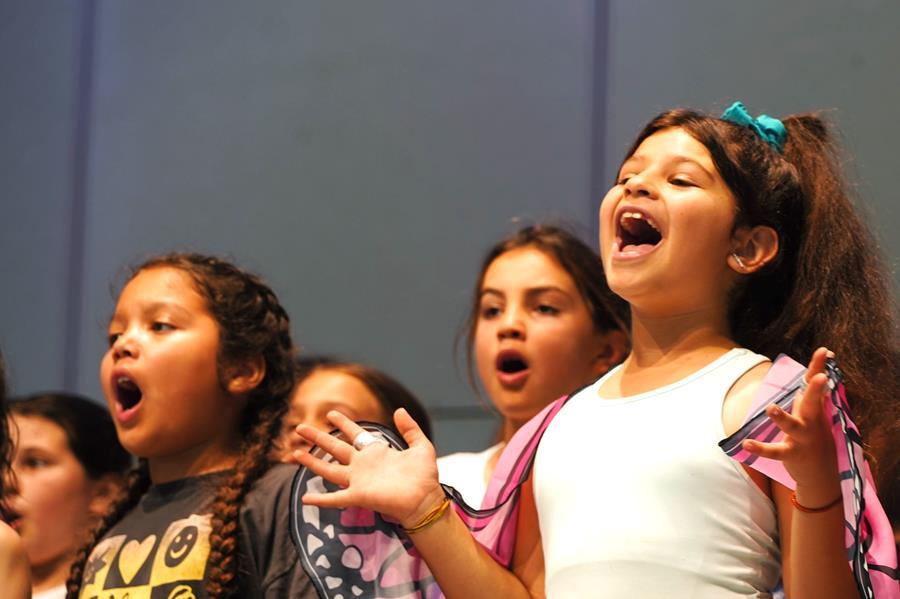 Usdan Summer Camp for the Arts students perform on stage in the McKinley Amphitheater