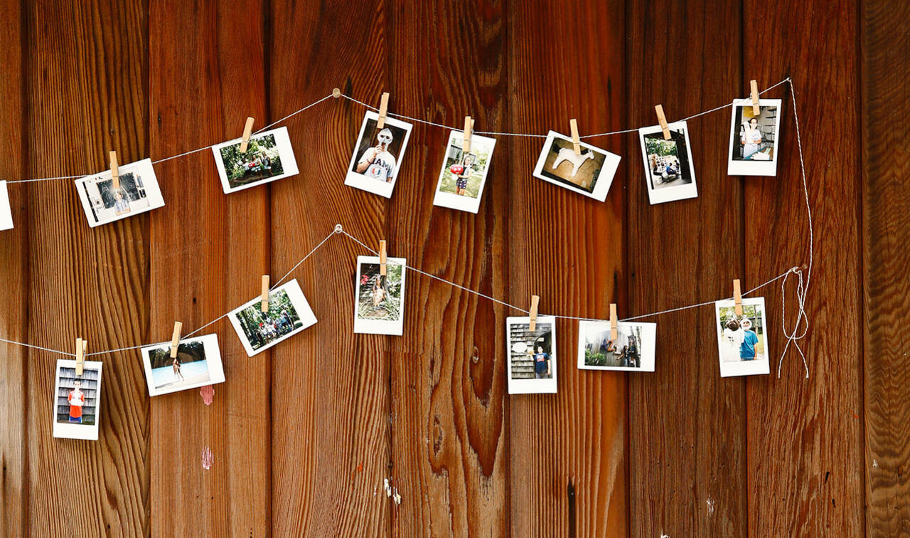 Polaroid photos on a string