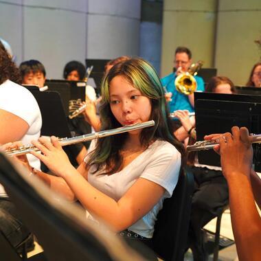 Usdan Summer Camp for the Arts music students perform on stage at the McKinley Amphitheater