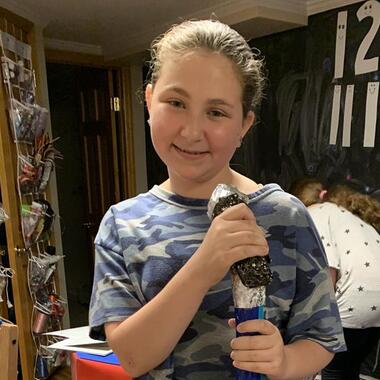 Photo of young girl named Sarah, smiling. Photo of young girl named Sarah, smiling.