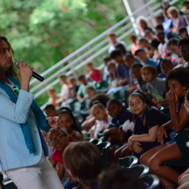 Maroulis performing for students