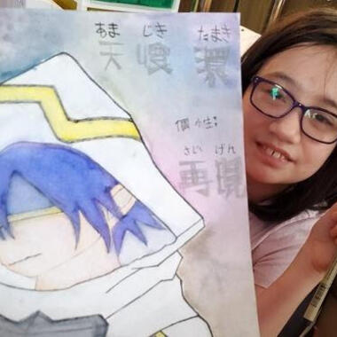 Young girl named Samantha holding up her comic artwork. Young girl named Samantha holding up her comic artwork.